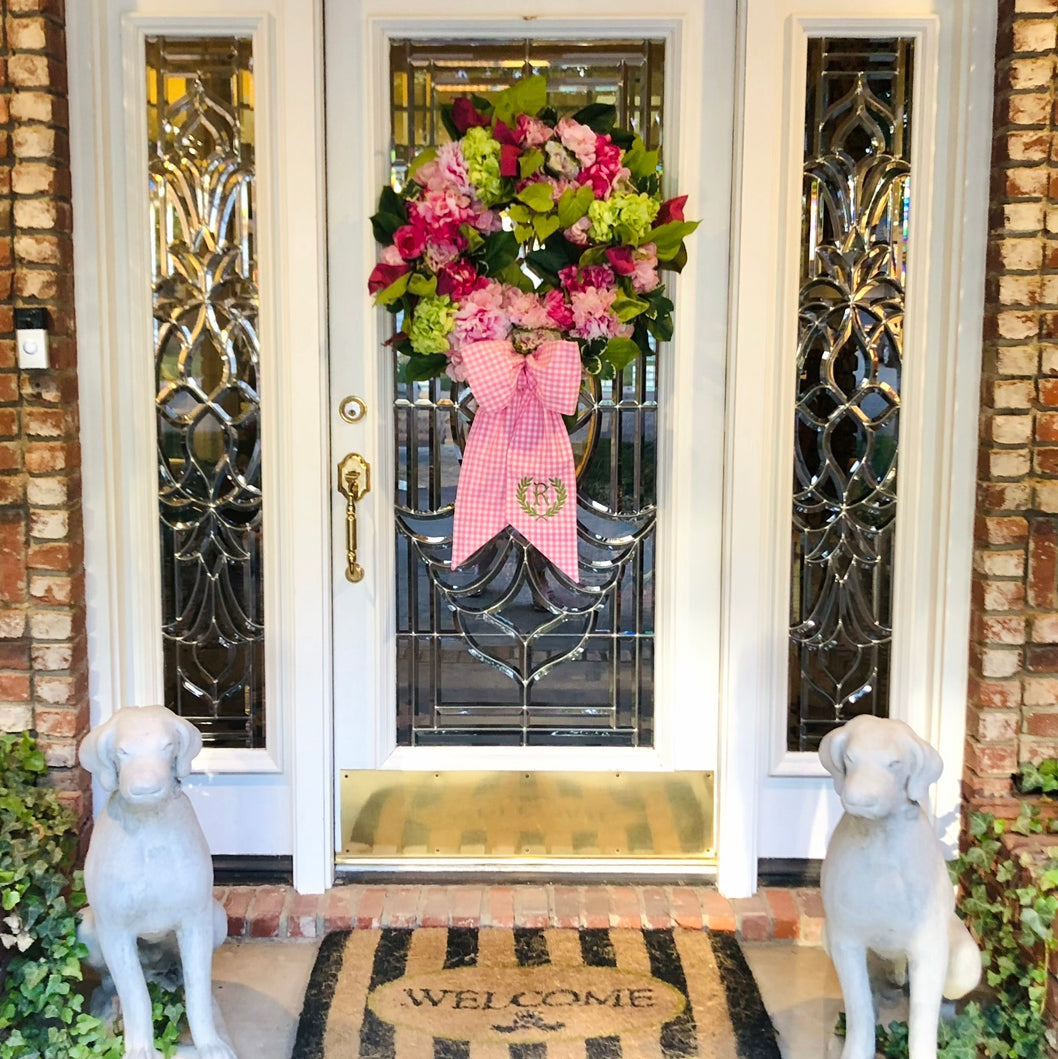 Spring pink and green hydrangea, peony, and cabbage wreath