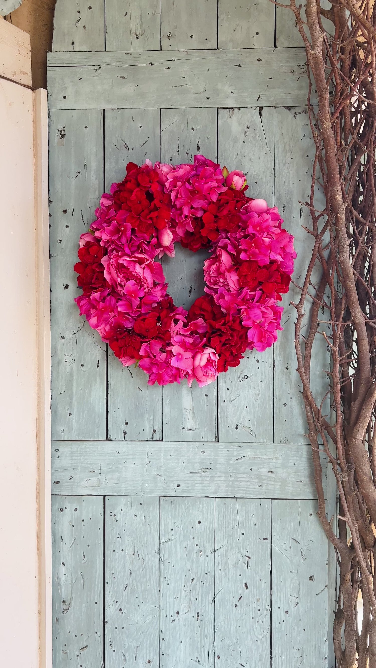 Pink and red hydrangea and peony floral wreath