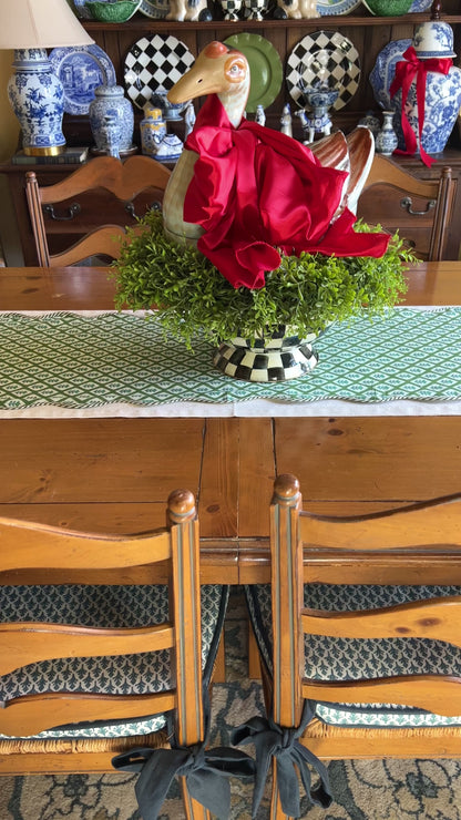 Green block print scalloped table runner with contrast piping
