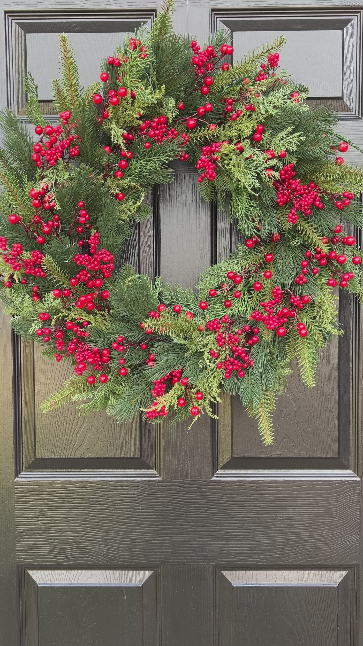 Holiday red berry and pinecone wreath 28”