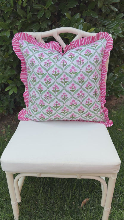 Pink and green floral trellis block print ruffle pillow cover with pink striped trim and back