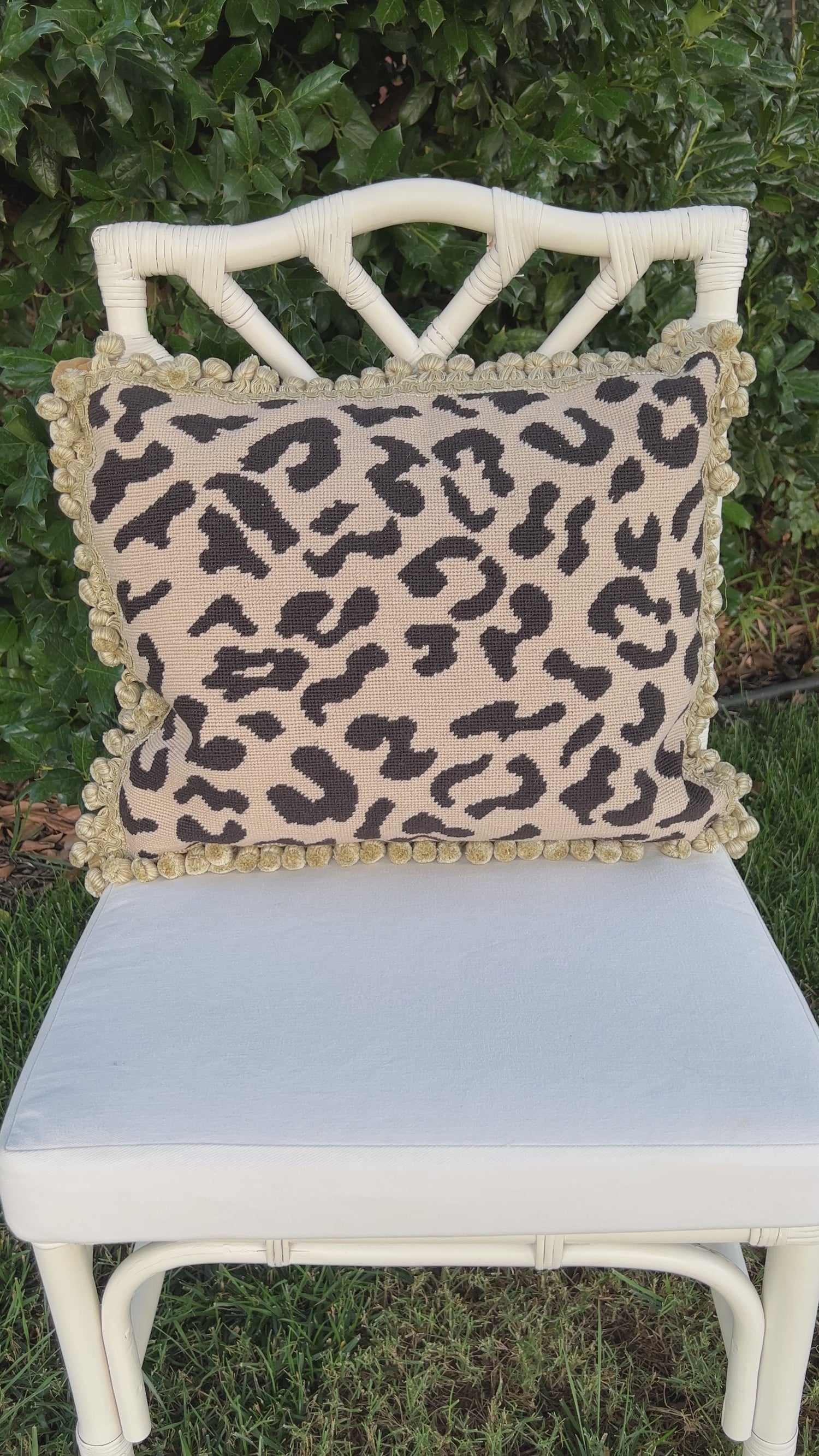 Beige and black leopard needlepoint throw pillow