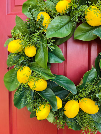 Lemon, magnolia, and boxwood wreath