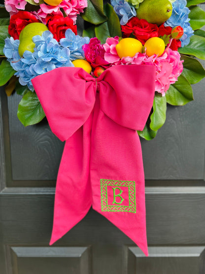 Pink Sunbrella wreath sash available with monogram