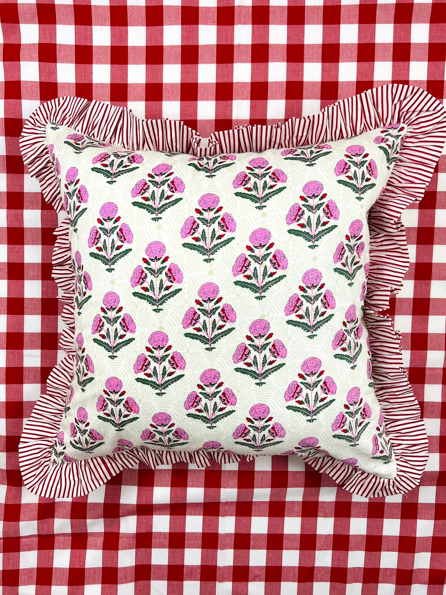 Pink and red floral block print ruffle pillow