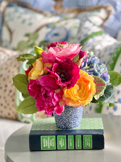 Petite faux floral arrangement in blue and white chinoiserie pot