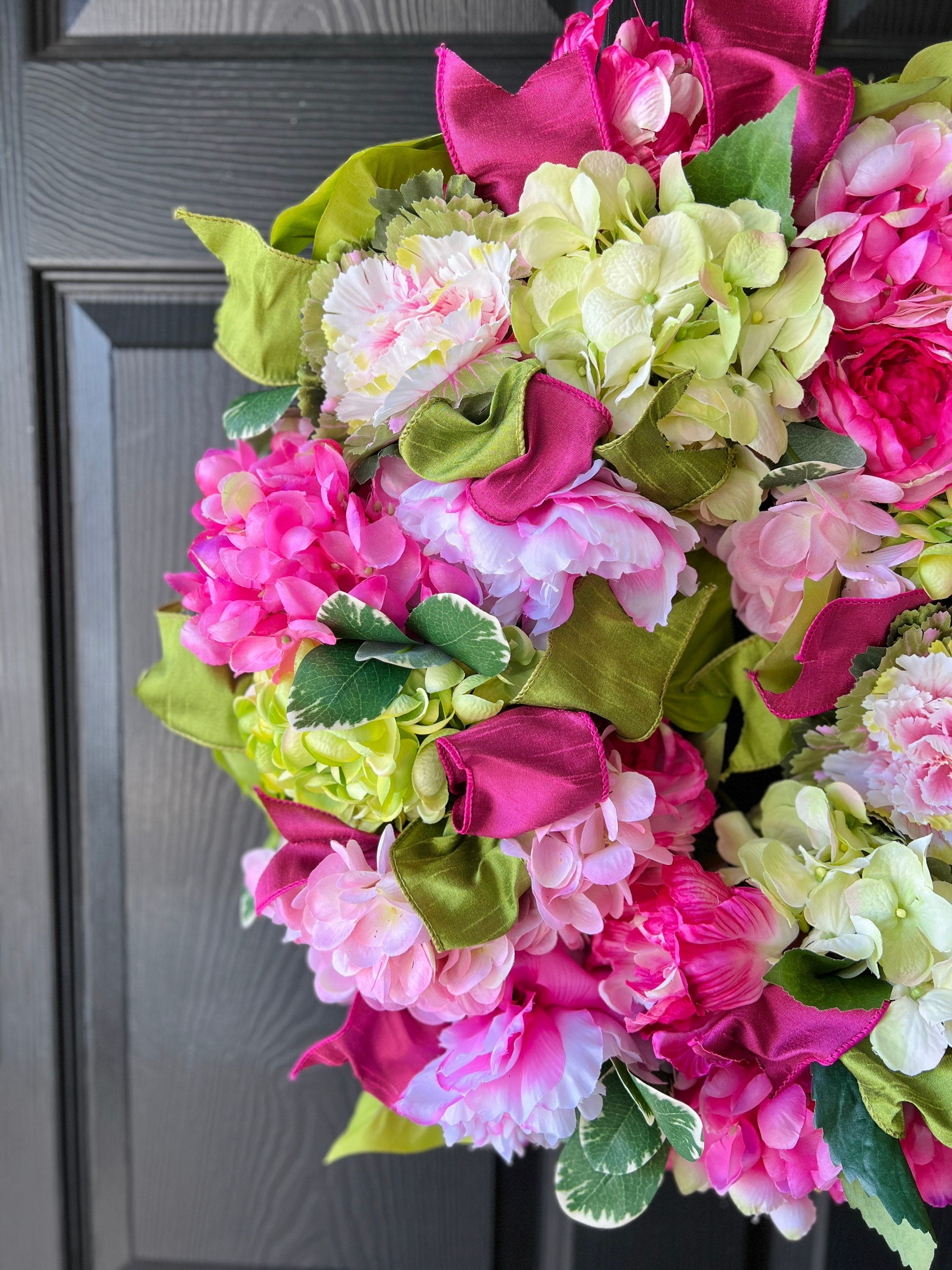 Spring pink and green hydrangea, peony, and cabbage wreath