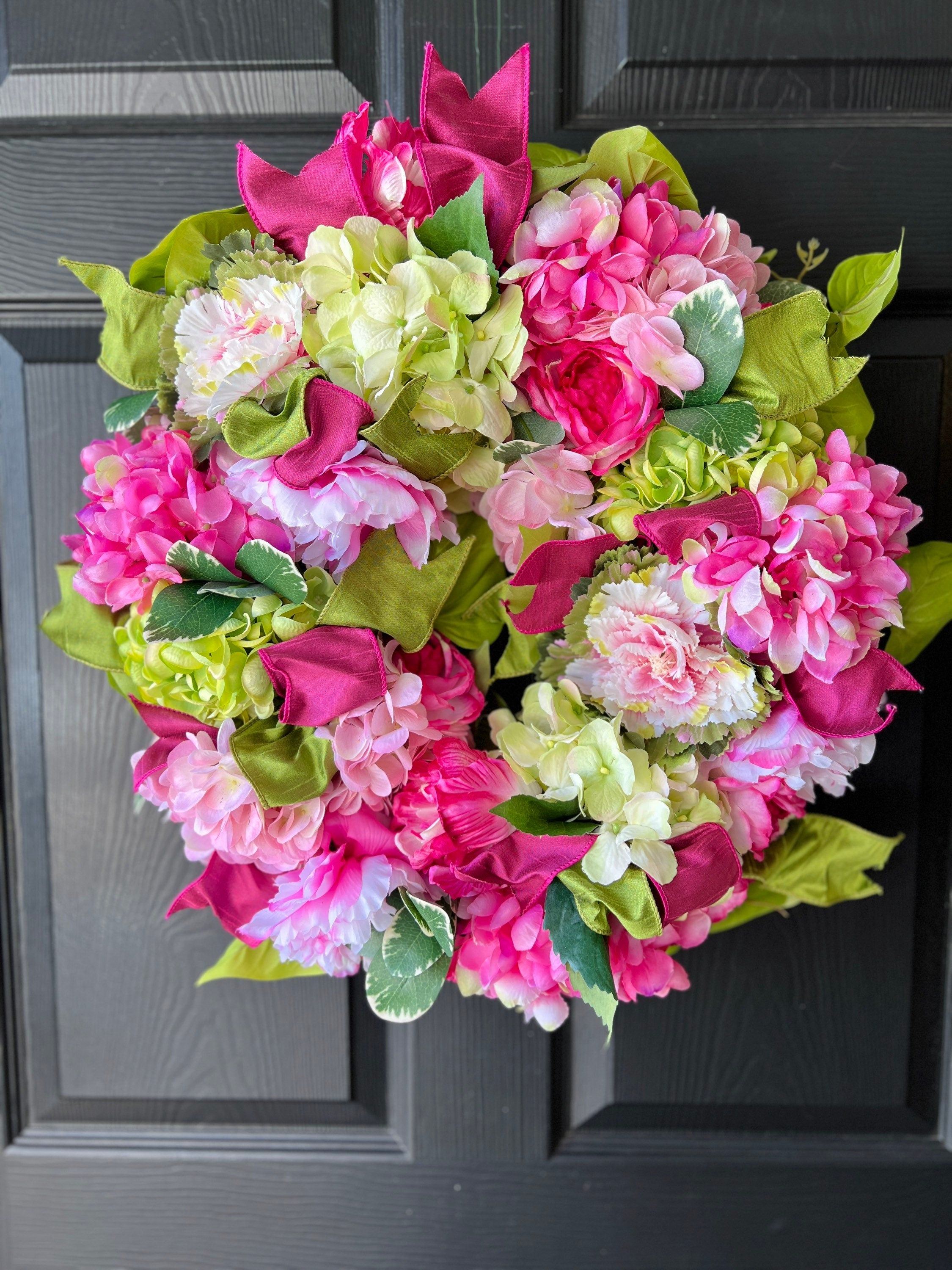 Spring pink and green hydrangea, peony, and cabbage wreath