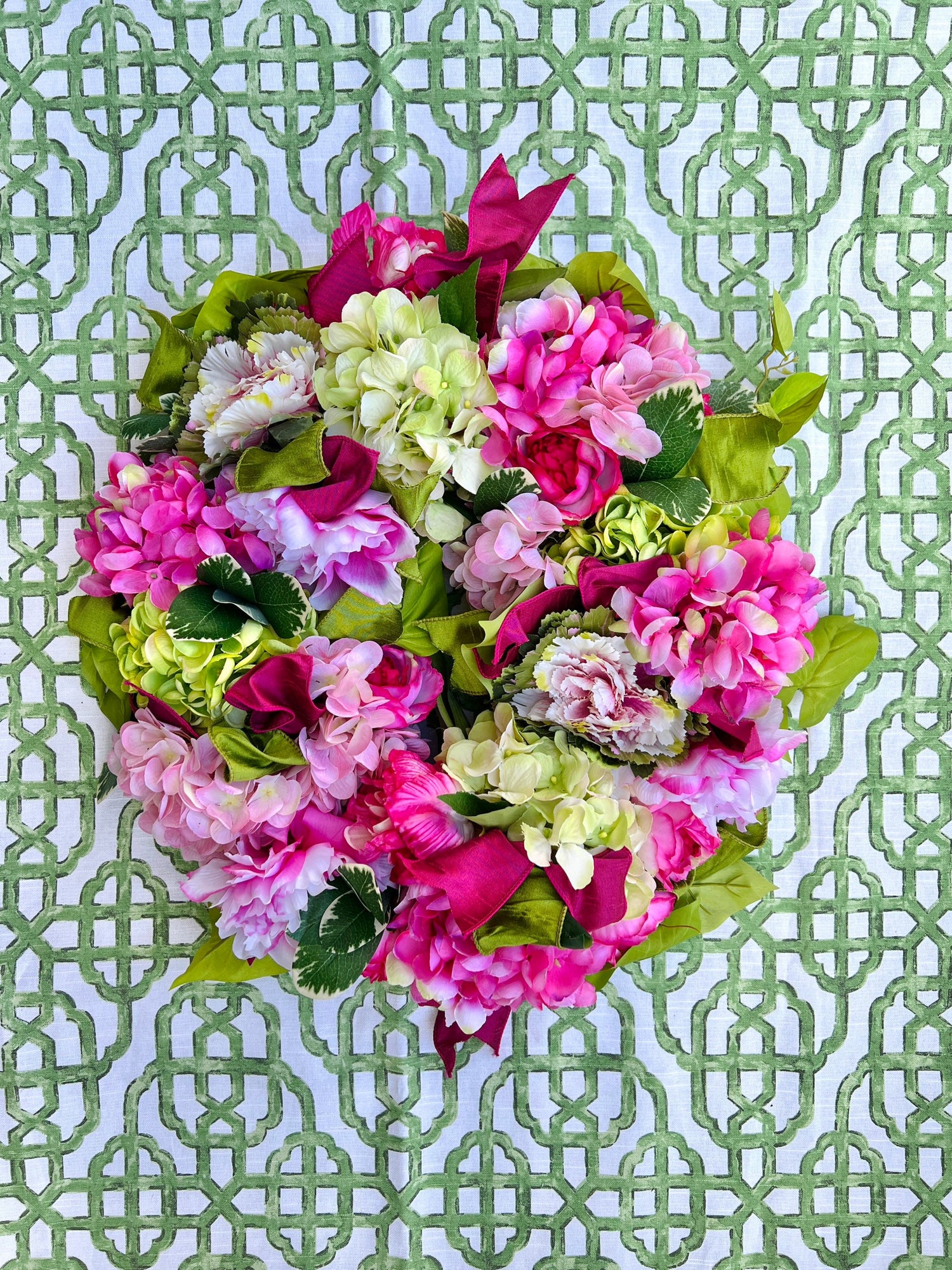 Spring pink and green hydrangea, peony, and cabbage wreath