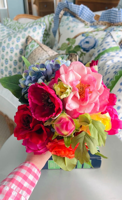 Petite faux floral arrangement in blue and white chinoiserie pot