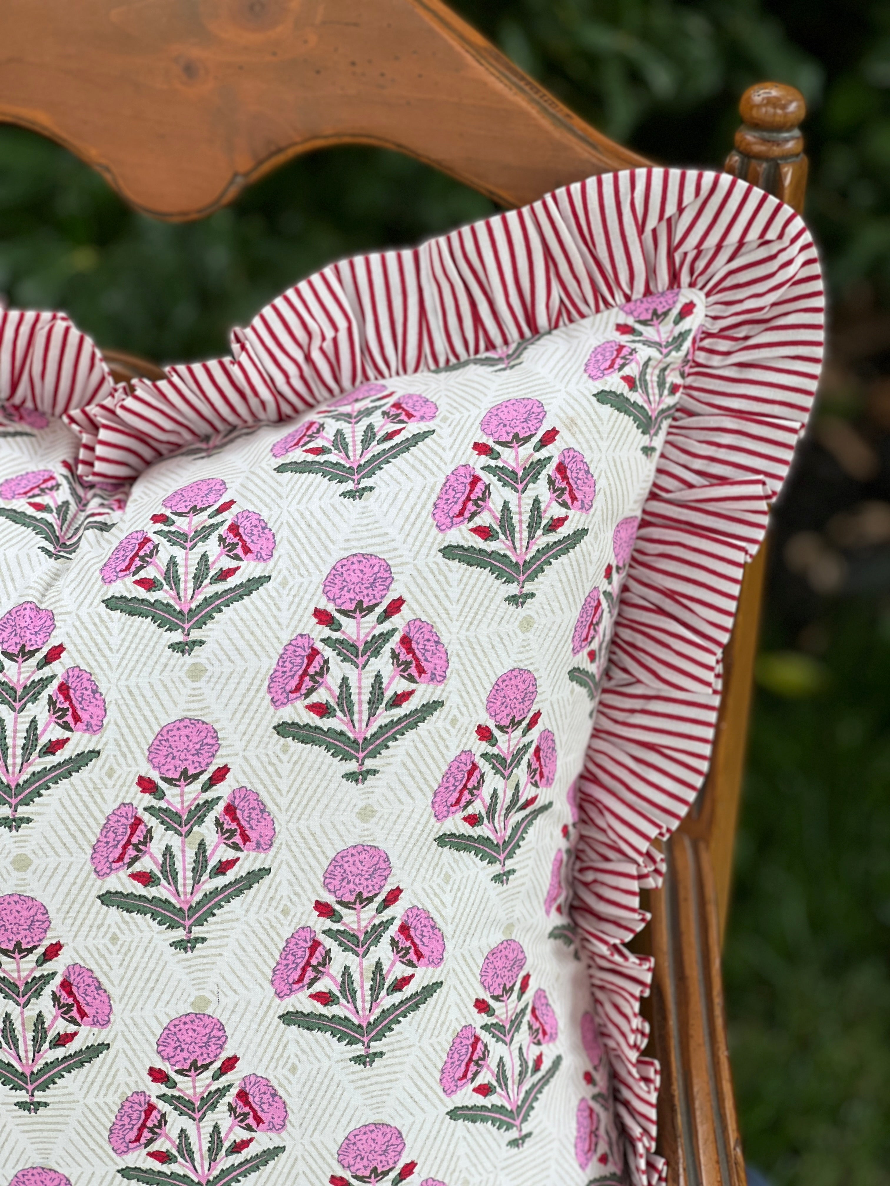 Pink and red floral block print ruffle pillow