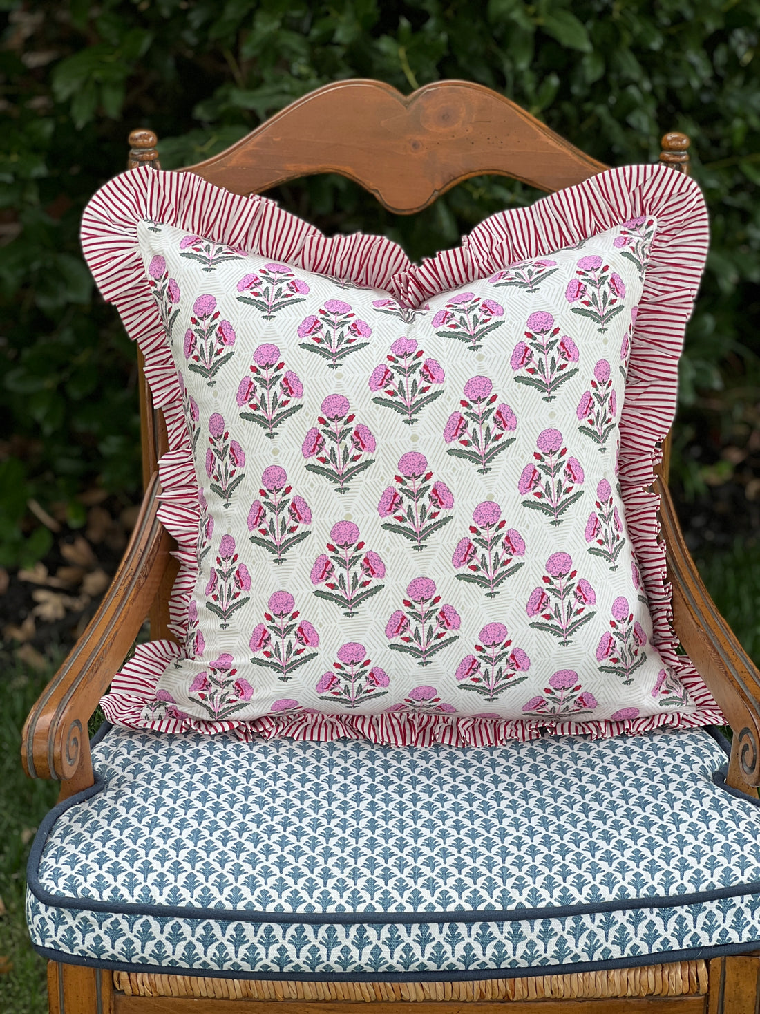 Pink and red marigold floral block print ruffle pillow